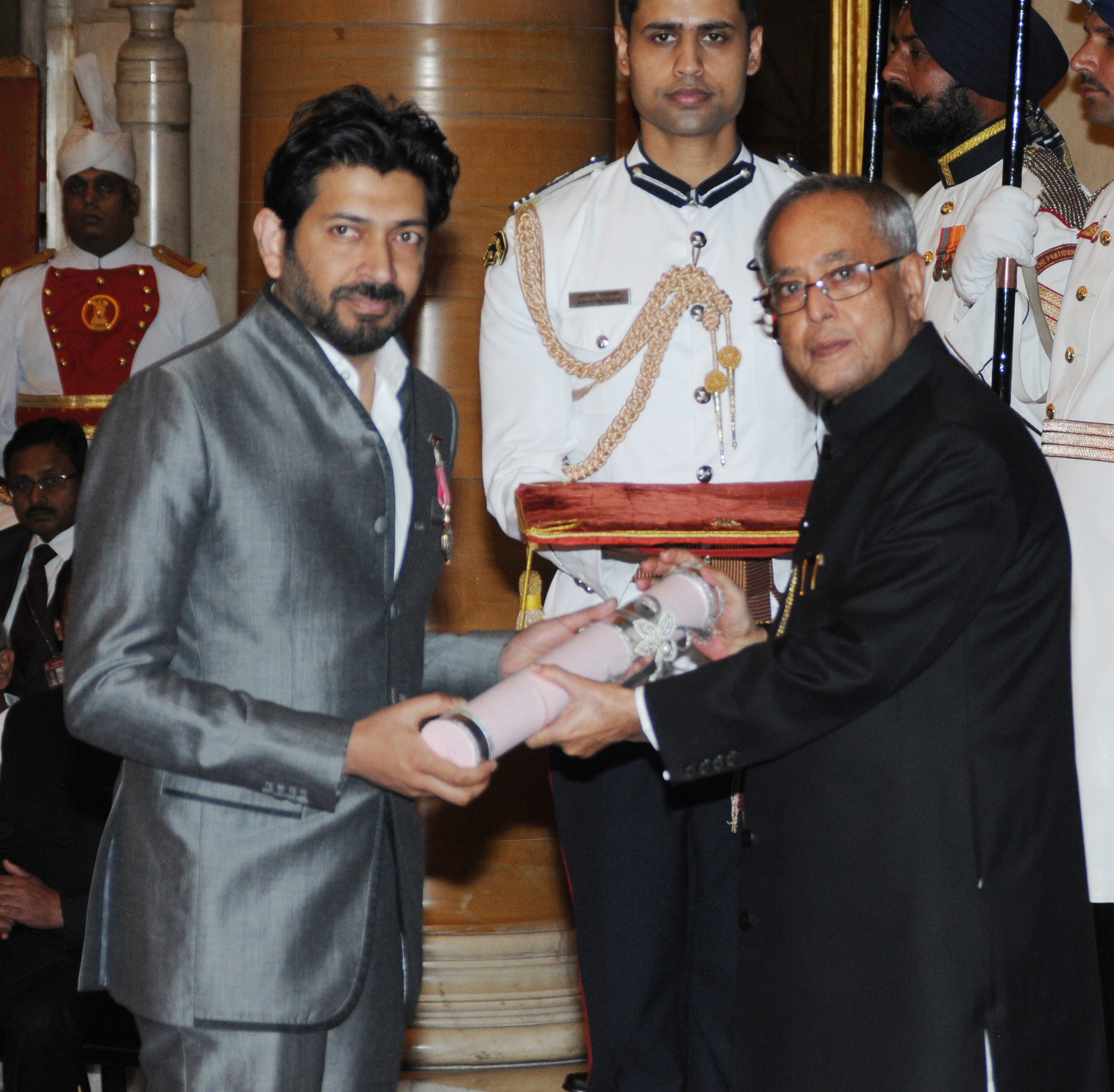 Dr. Pranab Mukherjee presenting the Padma Shri Award to Dr. Siddhartha Mukharjee