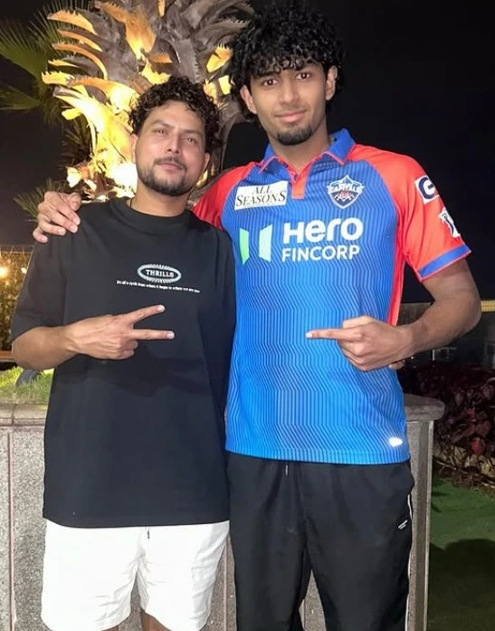 Aryaman Varma with Kuldeep Yadav