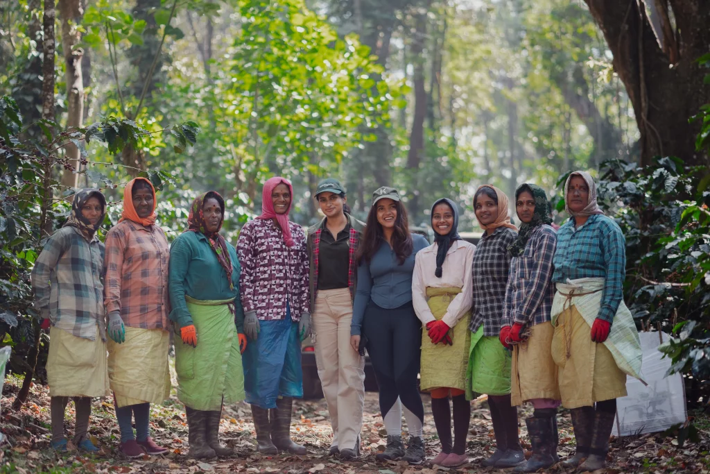 Ryana Kuruvilla with Kelachandra Coffee's estate team