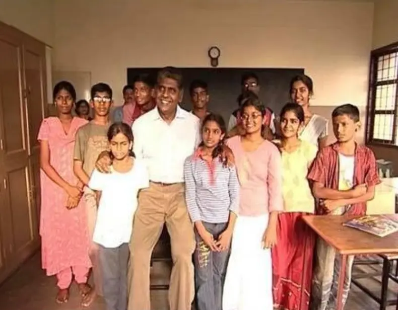 Vijay Amritraj with few of the beneficiaries of Vijay Amritraj Foundation
