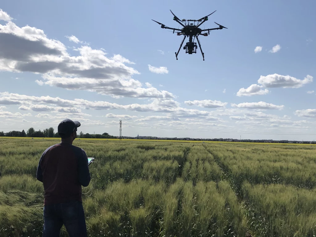 Keshav Singh with flying UAV System over the Breeding trial