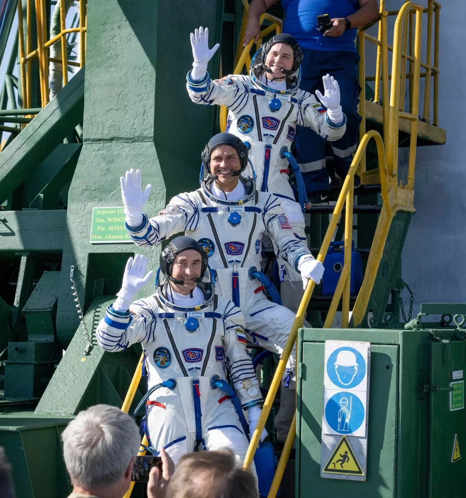Anil Menon and Russian cosmonauts Pyotr Dubrov and Anna Kikina just before beginning their mission on July 14 2026