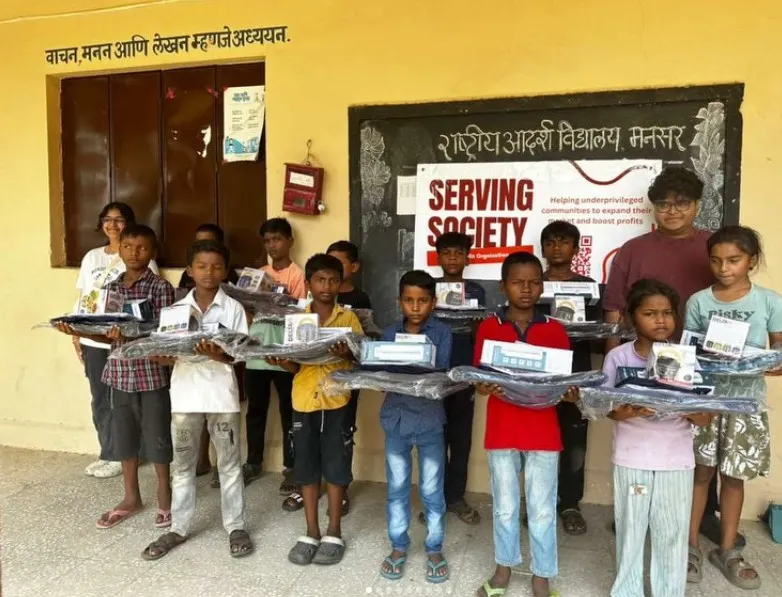 Dev Rai, high school student during community service in India